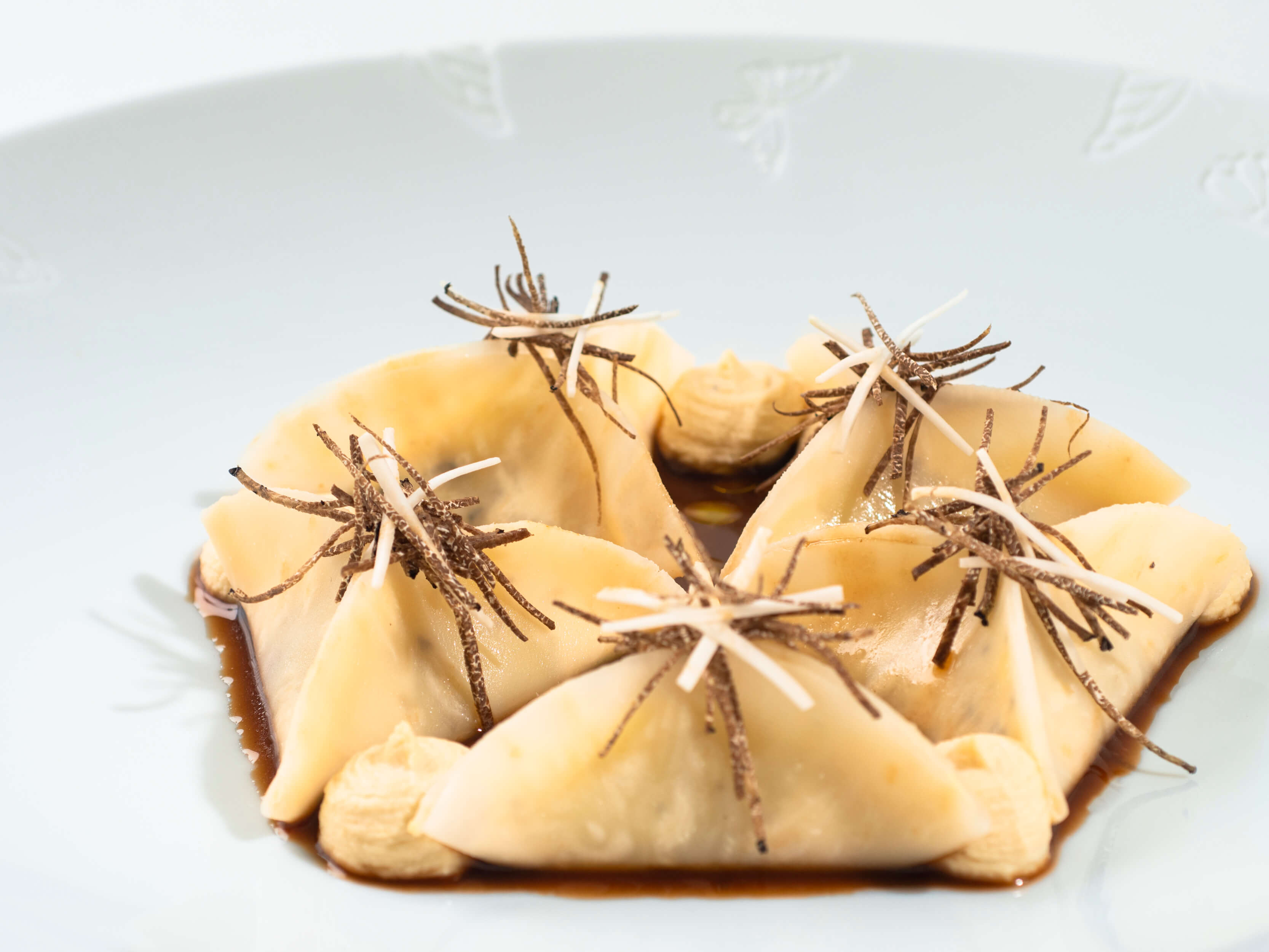 Triangolini di sedano with truffle and turmeric